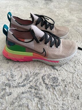 Nike Beige Knit Running Shoes with Black Swoosh and Neon Accents